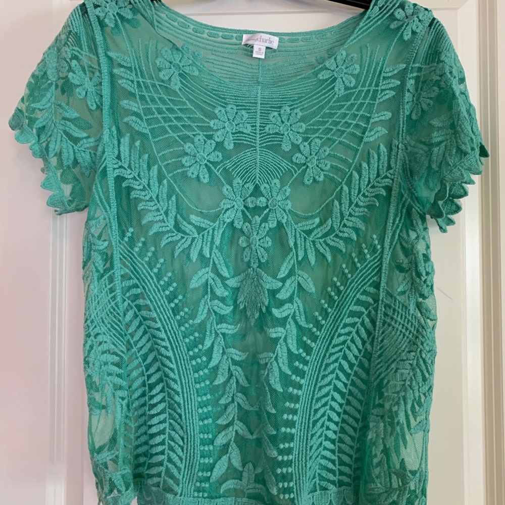 Lace overlay shirt.